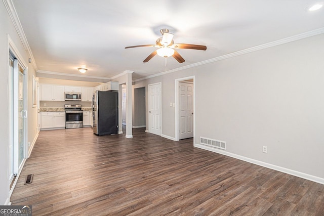 unfurnished living room featuring ceiling fan, dark hardwood / wood-style flooring, and crown molding