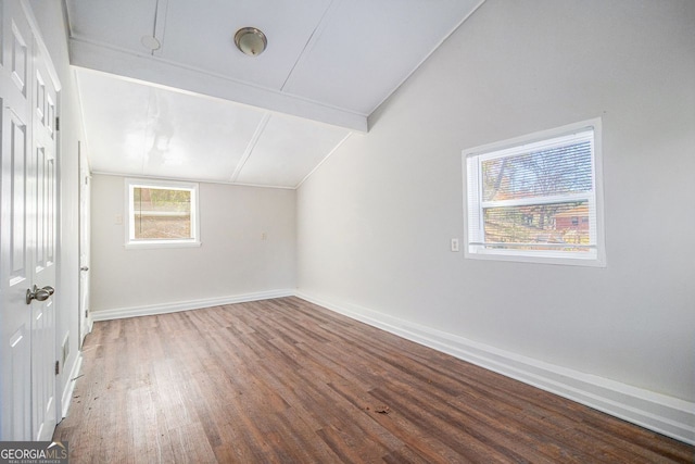 bonus room with vaulted ceiling with beams and hardwood / wood-style flooring