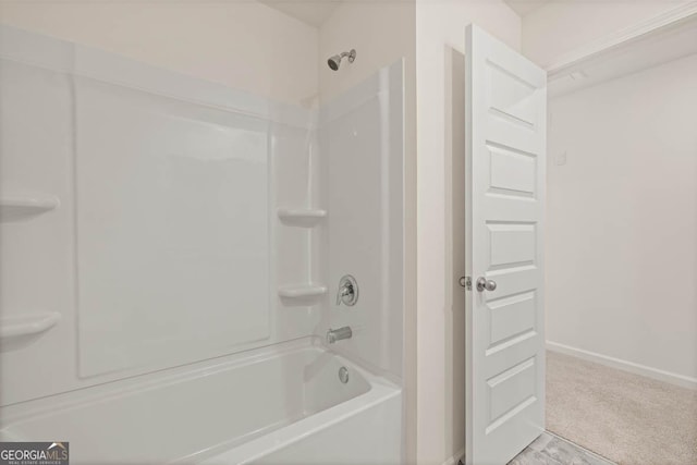 bathroom with washtub / shower combination