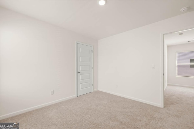 empty room with light carpet