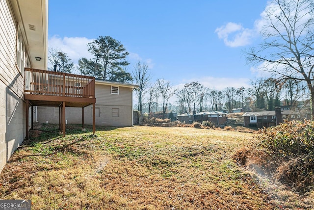 view of yard with a deck