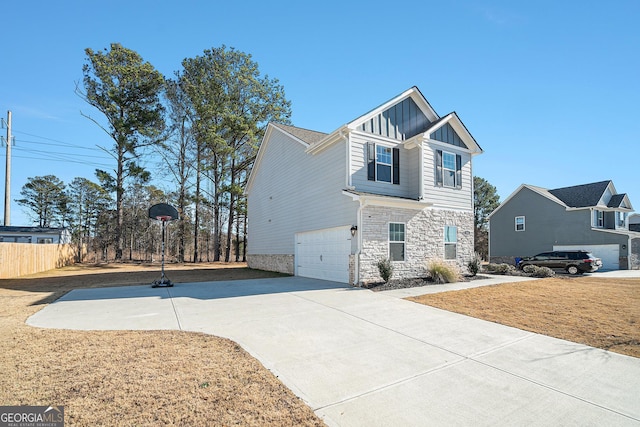 view of side of home featuring a garage and a lawn