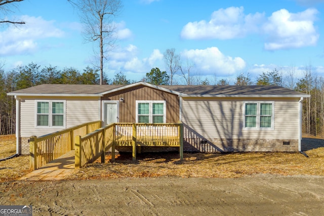 view of front of home with a deck