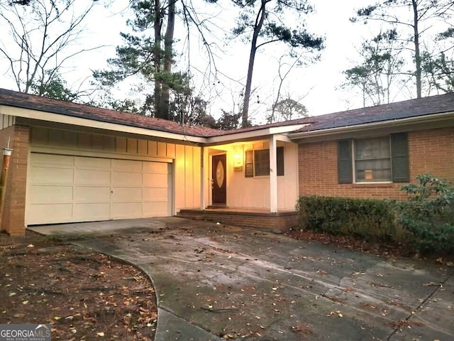 single story home with a garage