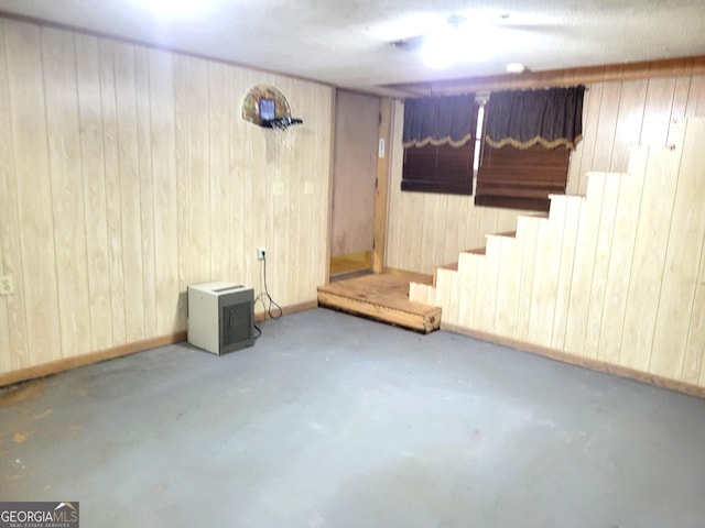 basement with wooden walls