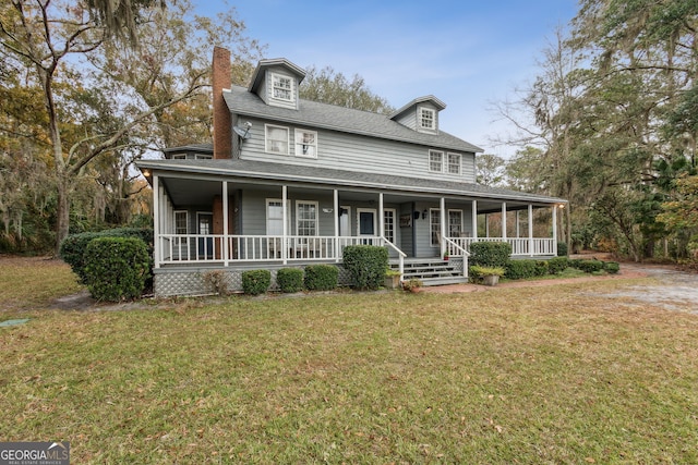 farmhouse with a front lawn and covered porch