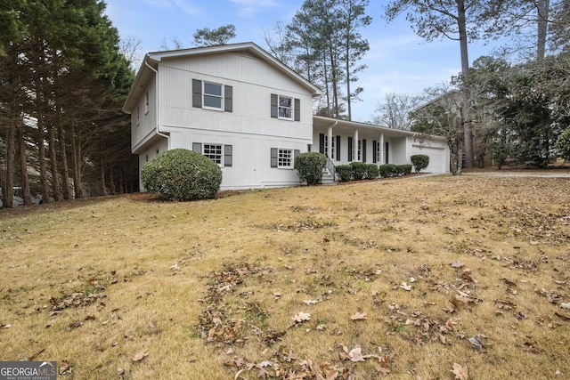 view of front facade with a porch and a garage