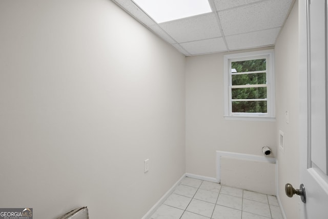 laundry room featuring light tile patterned floors