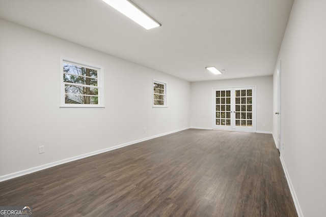 unfurnished room featuring dark hardwood / wood-style floors