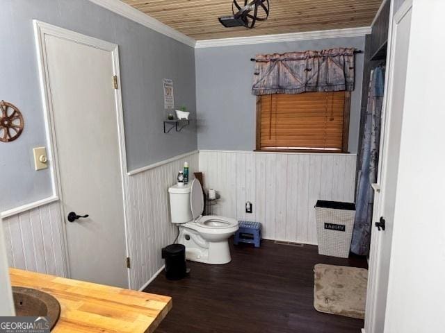 bathroom with ornamental molding, wood ceiling, vanity, hardwood / wood-style flooring, and toilet