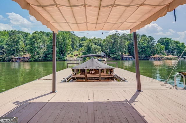 view of dock with a water view