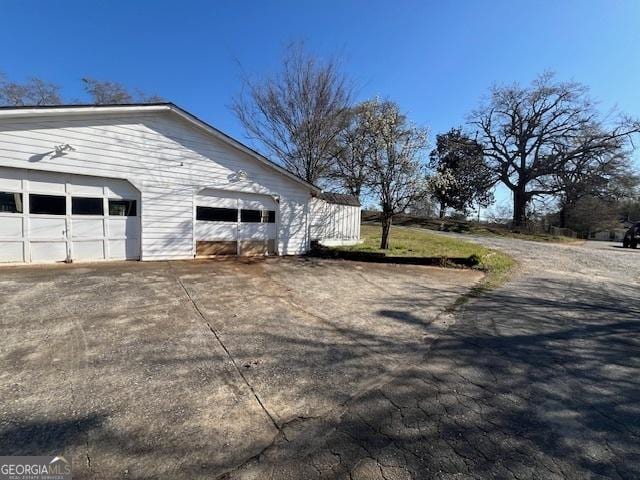view of home's exterior featuring a garage