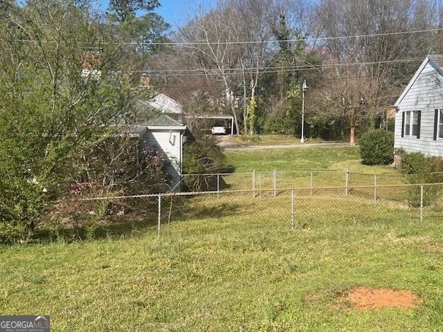view of yard with fence