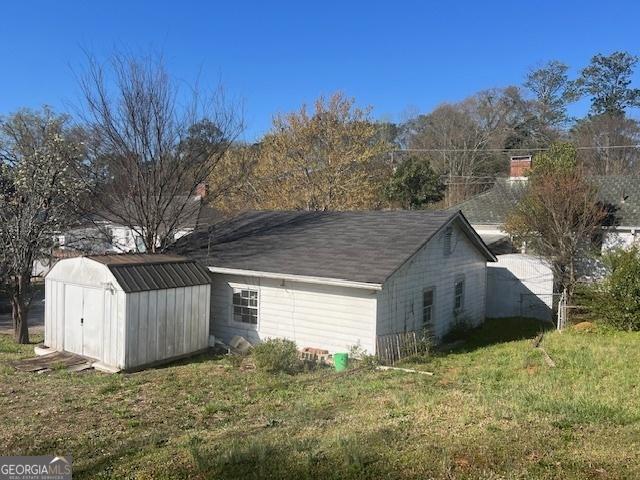 garage with a storage shed