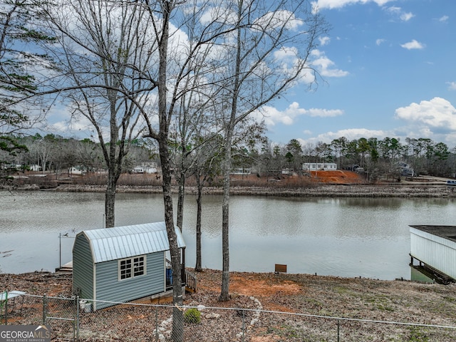 dock area with a water view