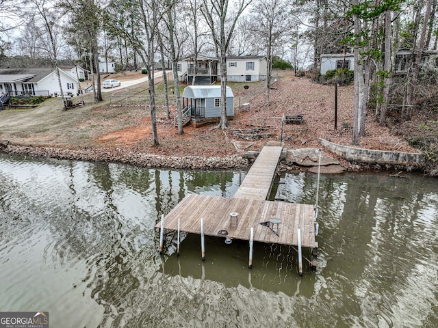 dock area featuring a water view