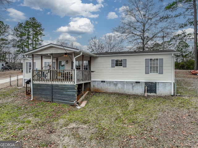 view of front facade with a front yard and a porch