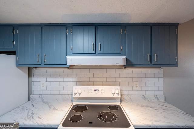 kitchen featuring electric range oven, blue cabinets, exhaust hood, and tasteful backsplash