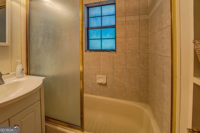 bathroom featuring vanity and enclosed tub / shower combo