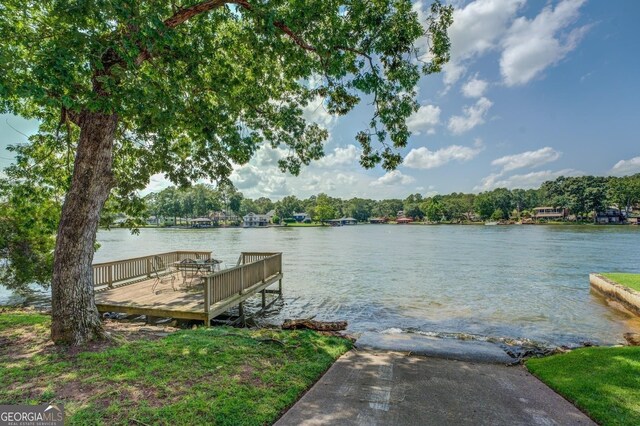 view of dock with a water view