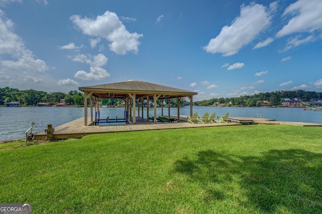 dock area featuring a yard and a water view