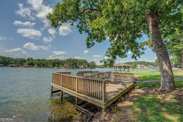 dock area with a gazebo and a water view