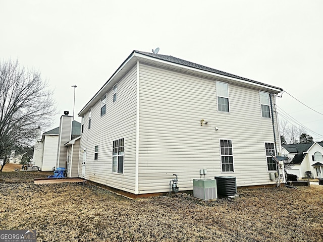 view of property exterior featuring central AC unit