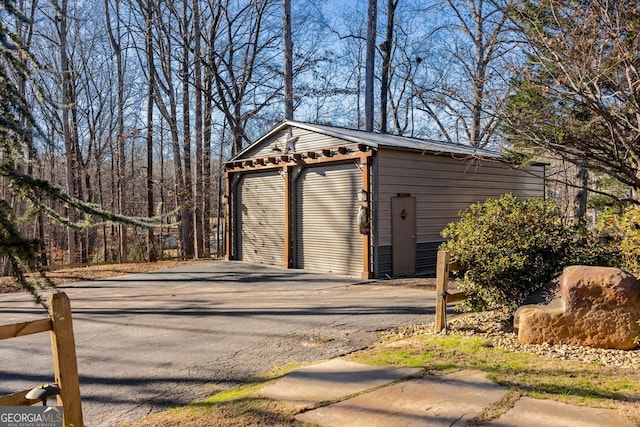 view of outdoor structure featuring a garage