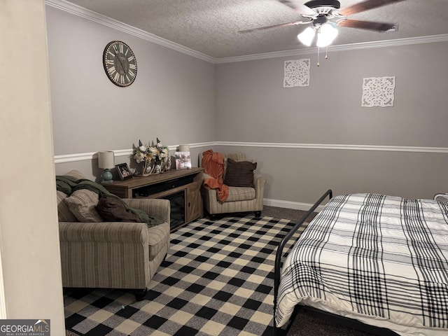 carpeted bedroom featuring a textured ceiling, ceiling fan, and ornamental molding