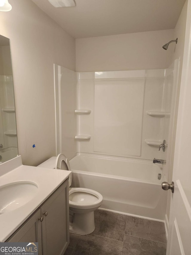 full bathroom with vanity, toilet, and shower / washtub combination