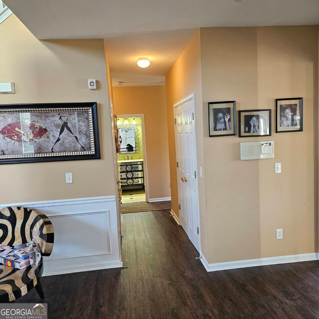 hallway featuring dark hardwood / wood-style floors