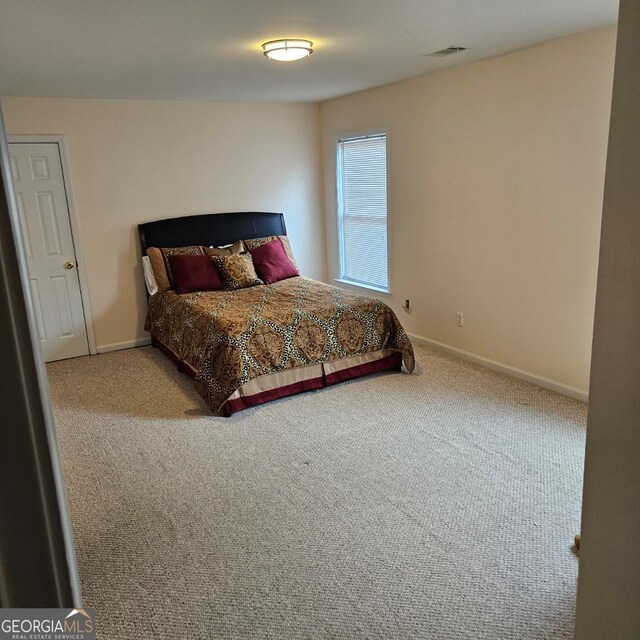 bedroom featuring carpet floors