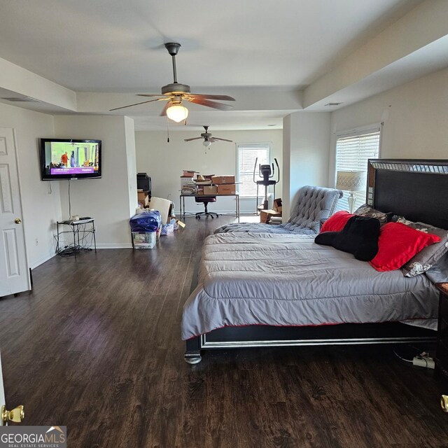 bedroom featuring ceiling fan and hardwood / wood-style floors