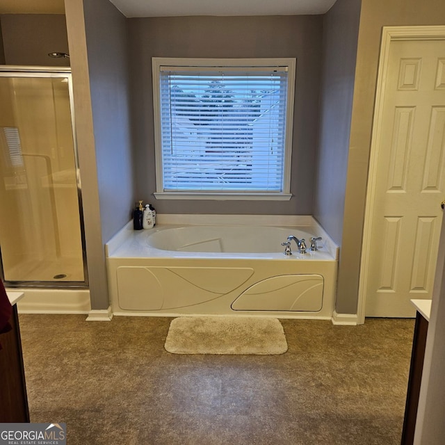 bathroom with vanity and independent shower and bath