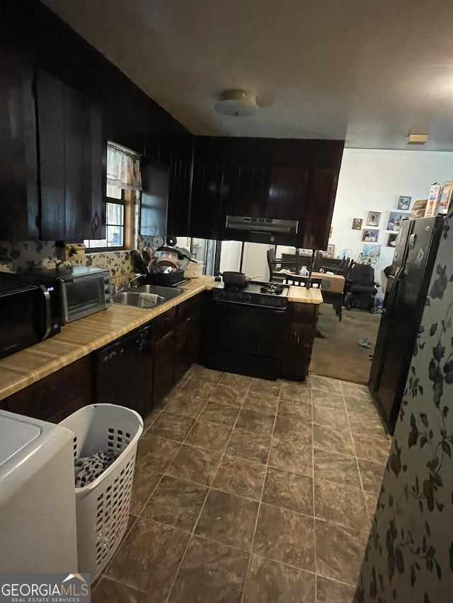 kitchen featuring dishwasher and sink