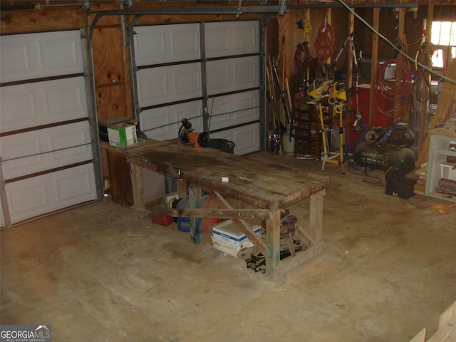 garage with a workshop area