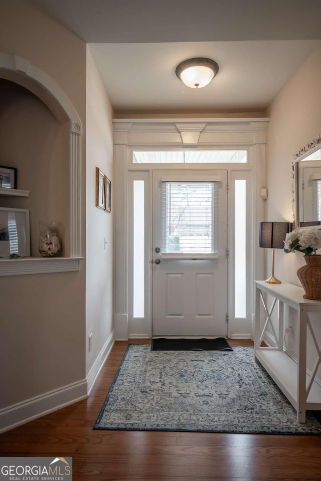 entrance foyer featuring hardwood / wood-style floors