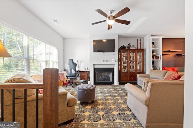 living room featuring ceiling fan