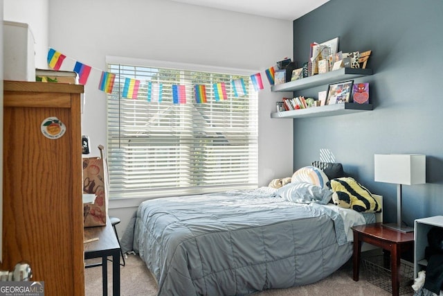 bedroom with light carpet