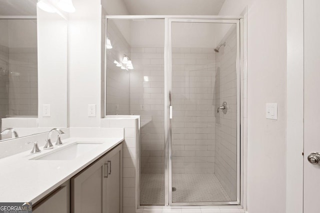 bathroom with vanity and walk in shower