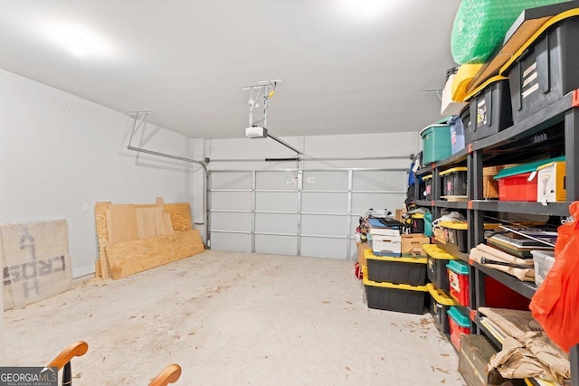 garage featuring a garage door opener