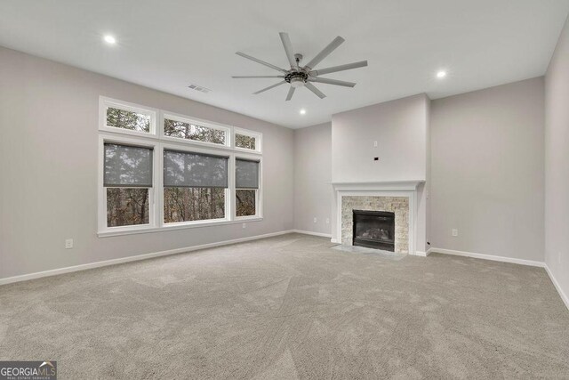 147 Stargaze Rdg, Canton, GA 30114 - unfurnished living room with visible vents, ceiling fan, and carpet flooring