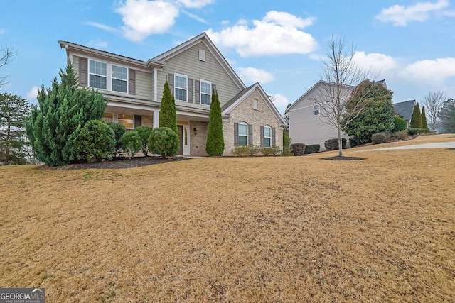 147 Stargaze Rdg, Canton, GA 30114 - view of front of home featuring a front lawn and brick siding