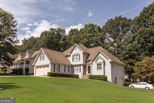 front of property with a garage and a front yard