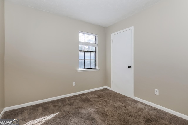 view of carpeted spare room