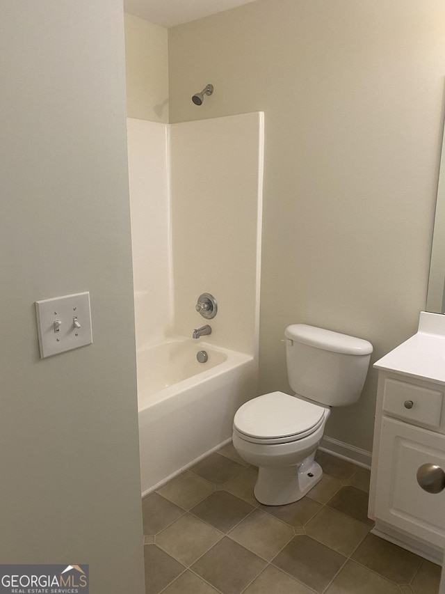 full bathroom featuring vanity,  shower combination, toilet, and tile patterned flooring