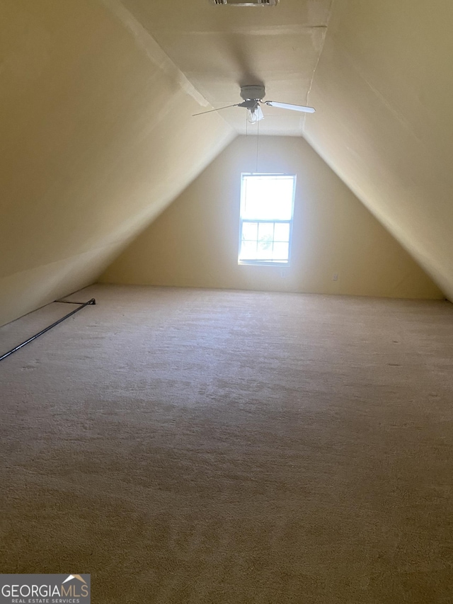 bonus room featuring carpet, ceiling fan, and lofted ceiling