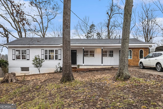 single story home featuring a porch