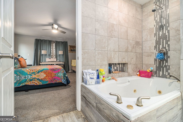 bathroom with ceiling fan and a tiled fireplace