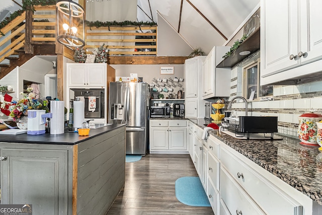 3107 Lotheridge Rd Unit 0, Gainesville, GA 30501 - kitchen featuring stainless steel appliances, dark countertops, dark wood finished floors, white cabinetry, and tasteful backsplash